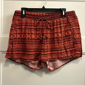 Old Navy red patterned shorts, size M